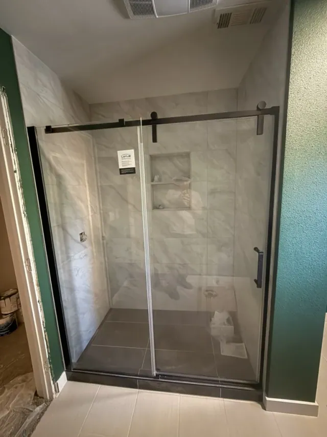 Finished glass shower enclosure by Remodel Tsaruk LLC