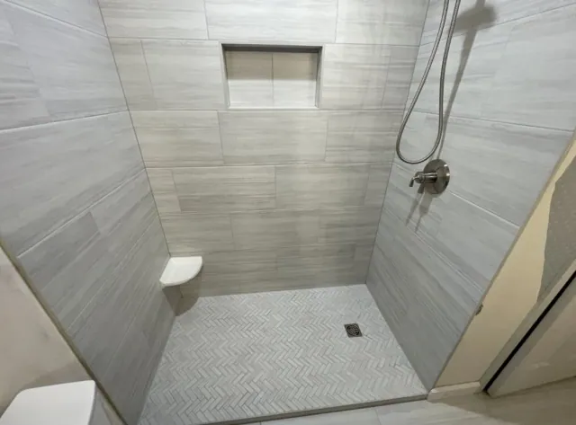 Gray tile shower remodel by Remodel Tsaruk LLC