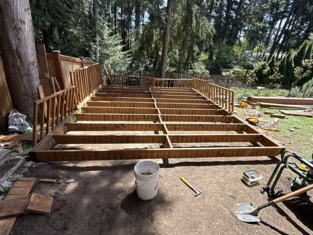 Side view of exposed deck joists and blocking during construction