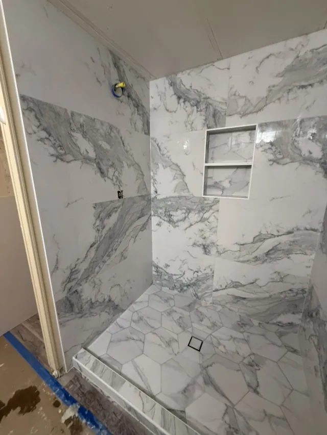 Bathroom tile installation in progress by Remodel Tsaruk LLC